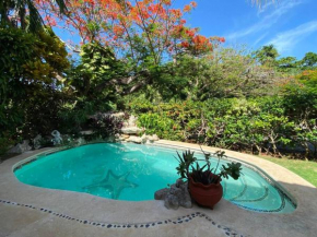 Unique Charming Bungalow steps to the beach